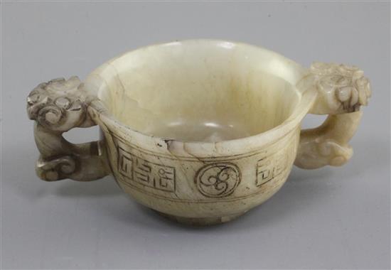 A Chinese white, grey and black veined jade two handled cup, 16th / 17th century, width 11.5cm